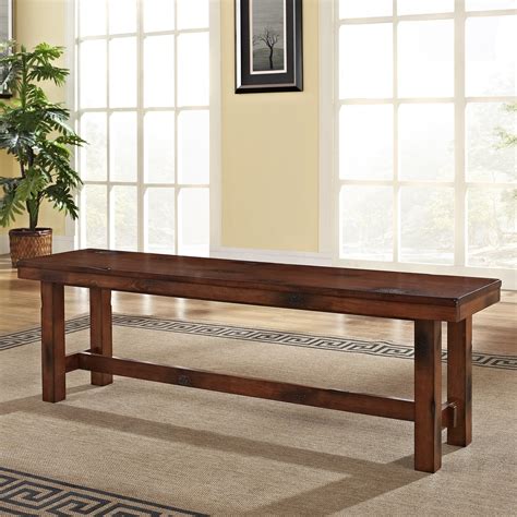 Teak dining bench .